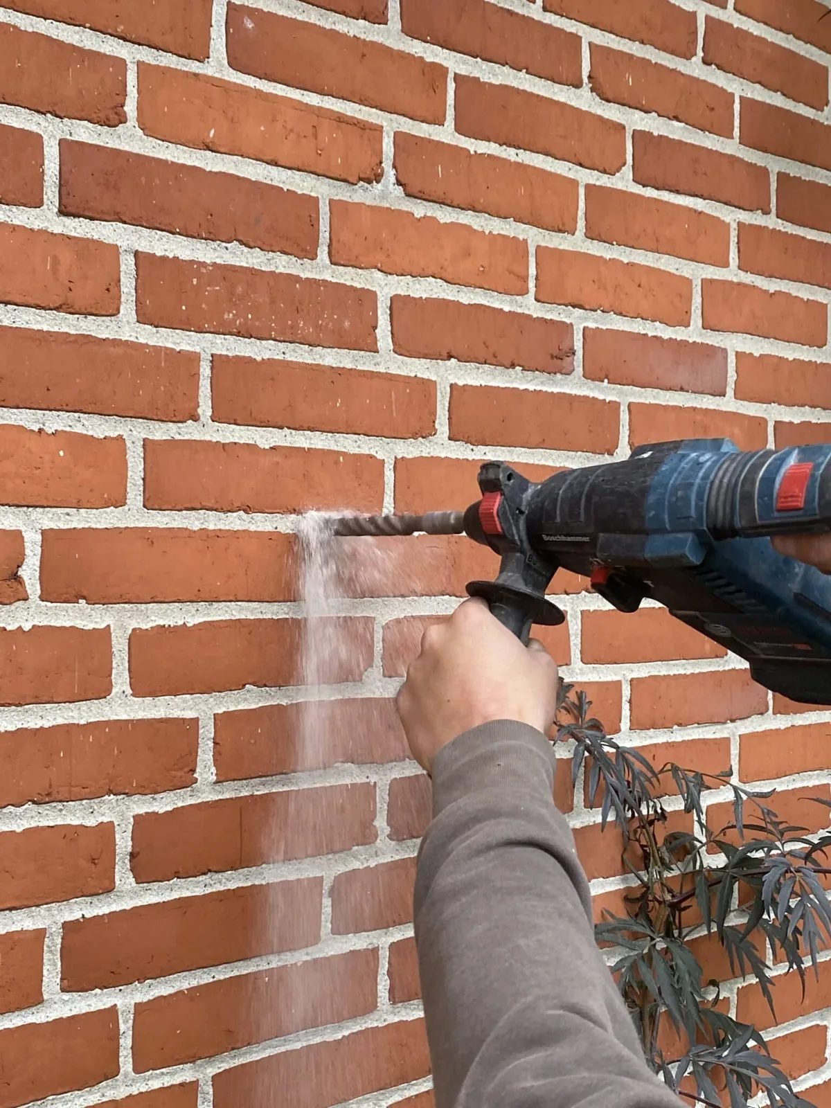 Hulmursisolering i arbejde